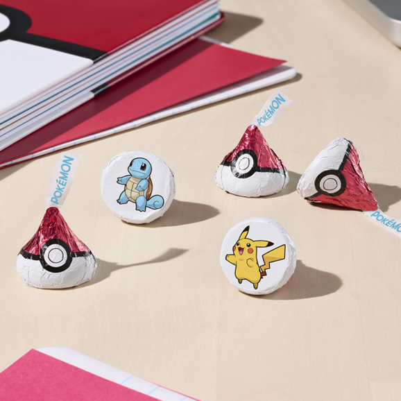 HERSHEY’S x Pokémon chocolate bars and KISSES featuring Pokémon from the Kanto region and various Poké Balls are available now at grocery stores and online