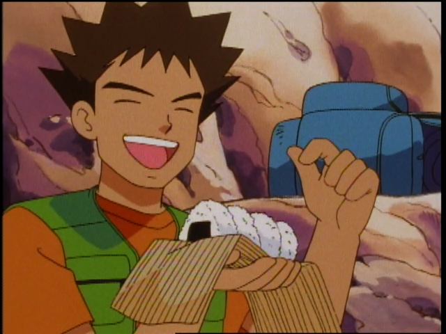 Video – Ash, Misty and Brock try to calm an angry wild Mankey with Brock’s homemade “doughnuts”in this official clip from Pokémon: Indigo League